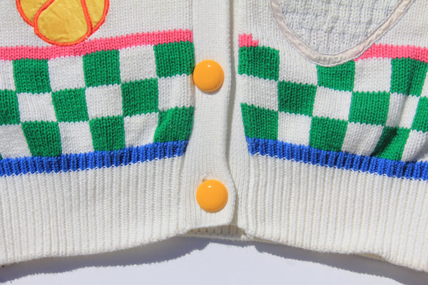 White game set match sweater vest