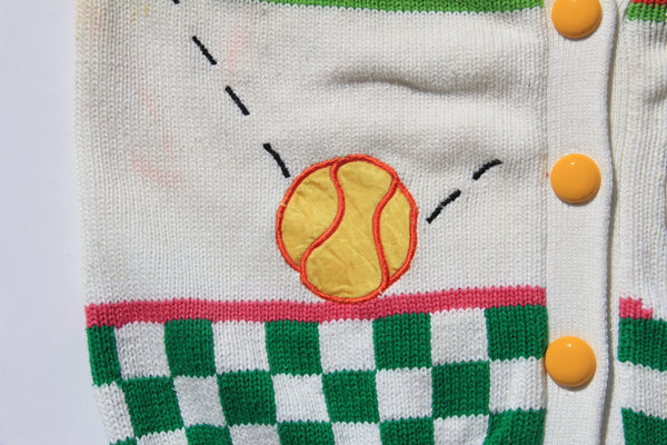 White game set match sweater vest