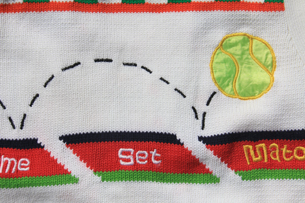 White game set match sweater vest